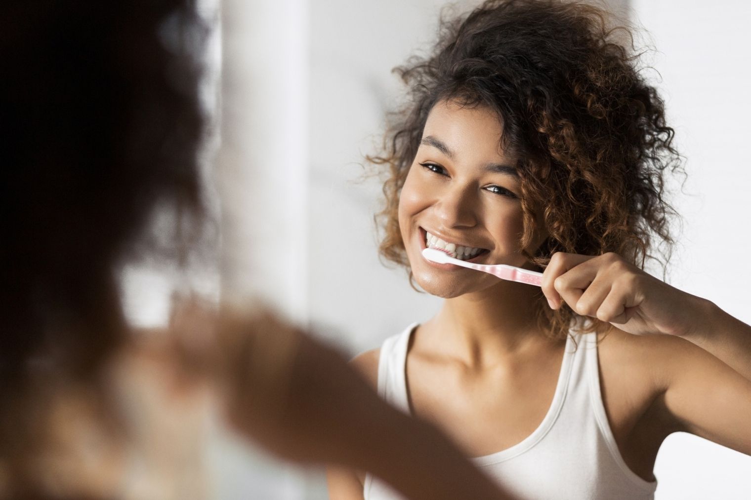 Brushing teeth smiling